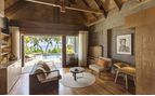 living area beachfront pool villa
